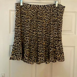 Never worn no tags pleated leopard print skirt. Zipper. Fully lined